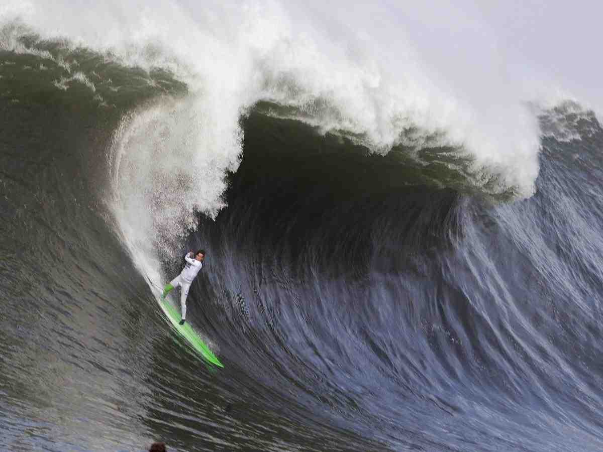 Did Garrett ever surf a 100-foot wave?