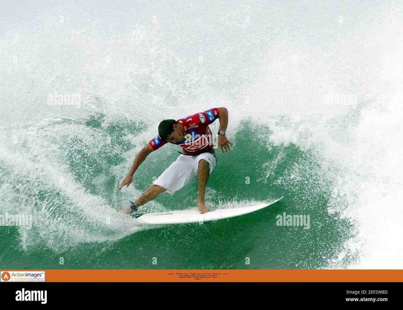 Where did Andy Irons grow up surfing?