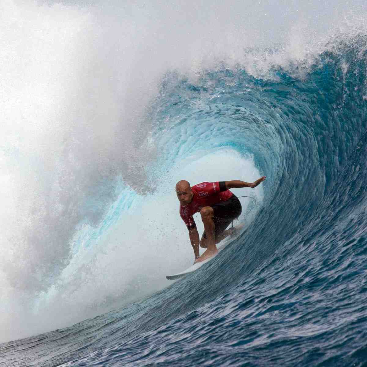 Who has won the most surfing world titles?