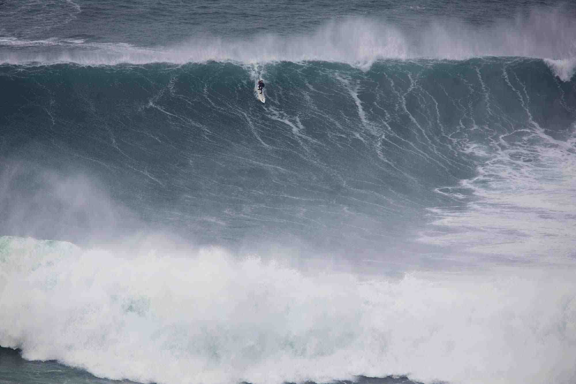 Who surfed 100 foot waves?