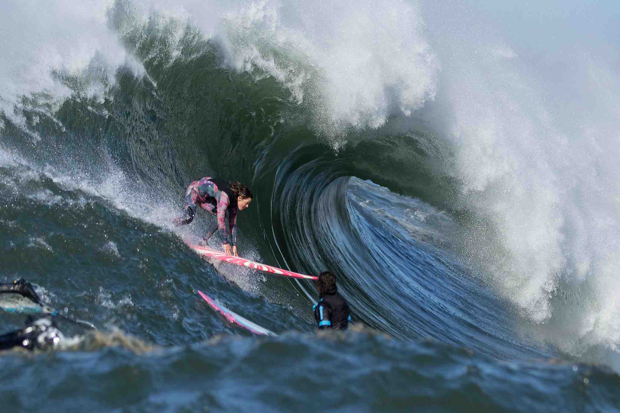 How do you get comfortable with big waves when surfing?