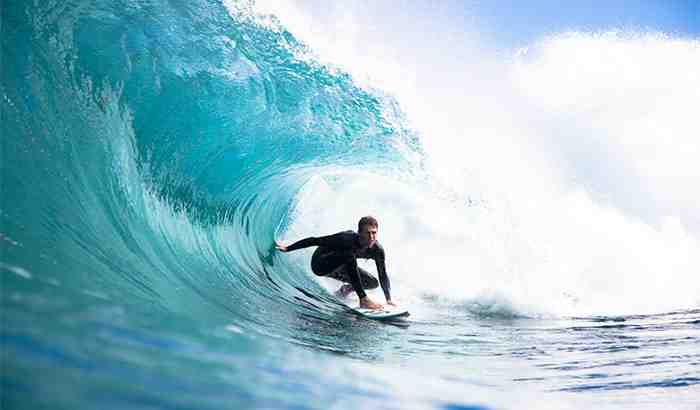 How does surfing improve mental health?