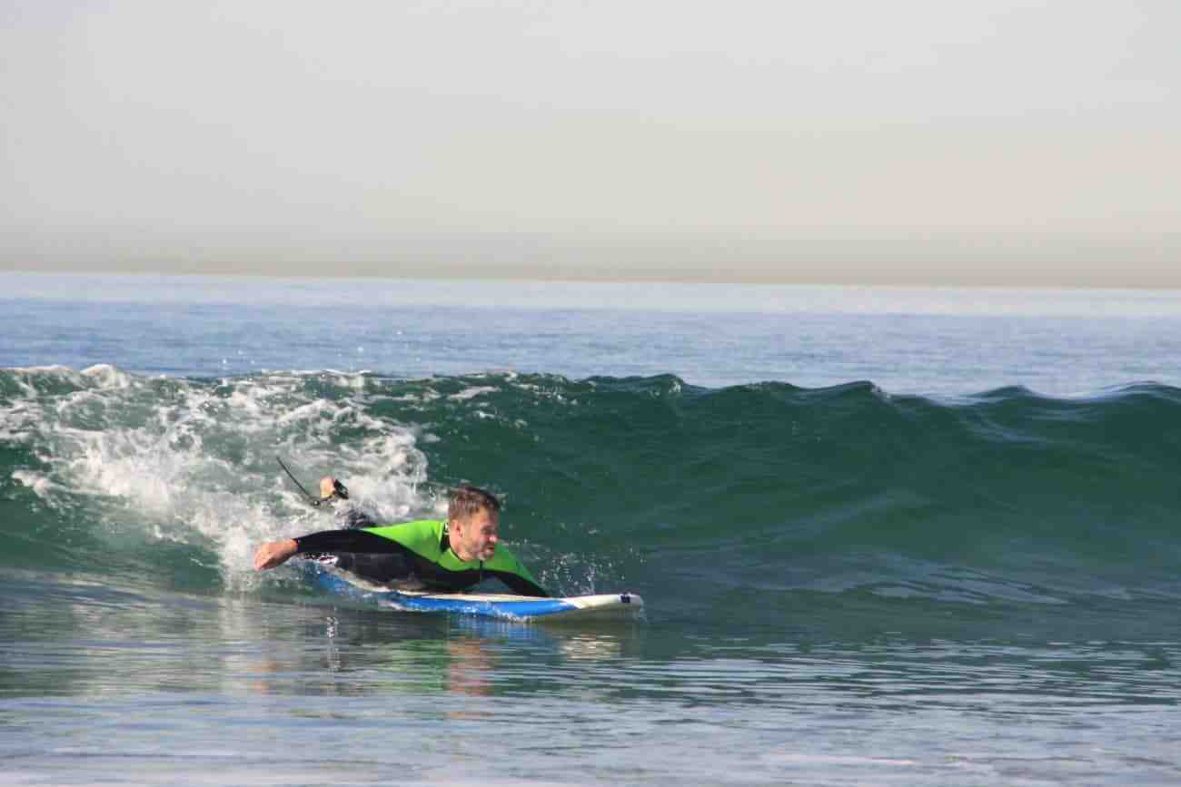 How fast do I need to paddle to catch a wave?