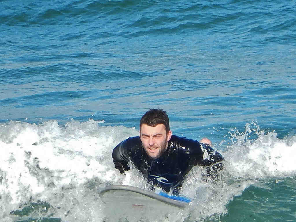 Is surfing a low impact sport?