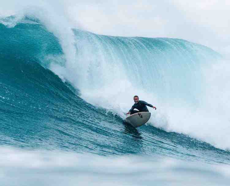 What are the challenges of surfing?