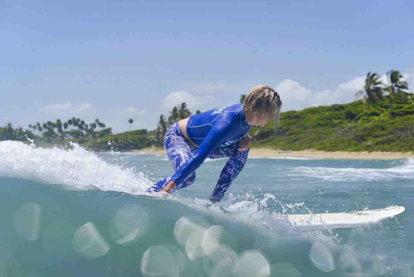 Why do surfers touch the wave?
