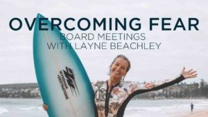 When did Layne become a professional surfer?