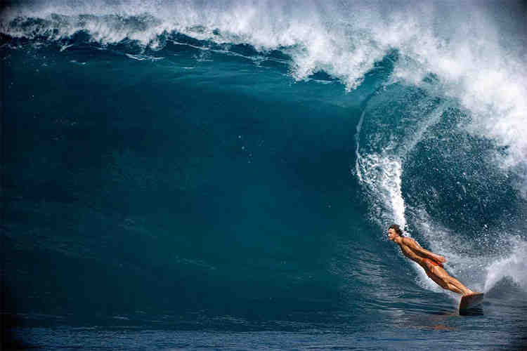 Which Australian surfer has won the most world titles?