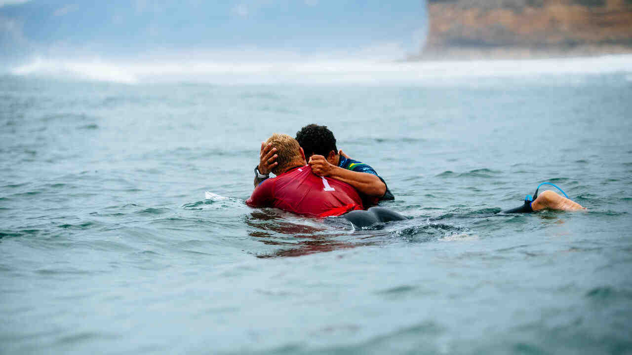 What surfer won the most world titles?