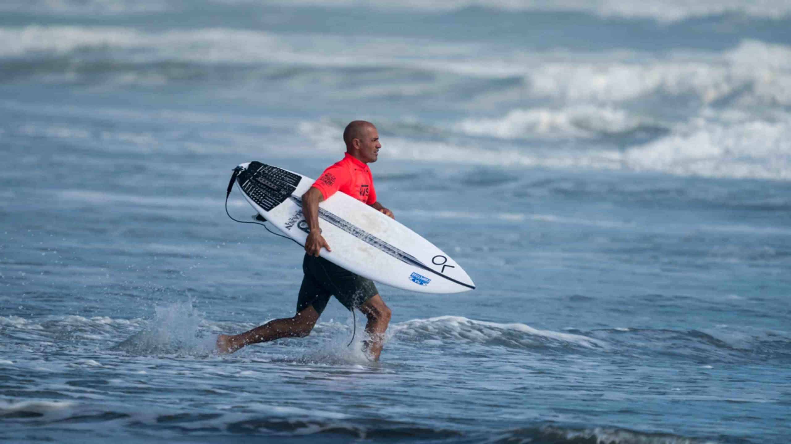 What years did Kelly Slater won world titles?