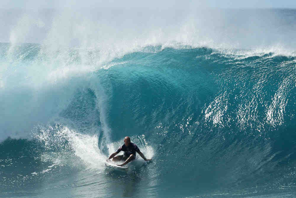 Which surfer has won the most titles?