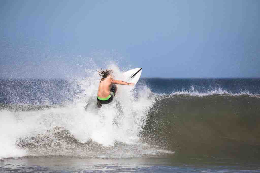 How do surfers know when to surf?