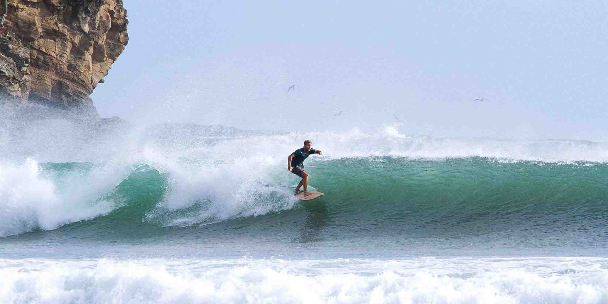 How do you build strength in surfing?