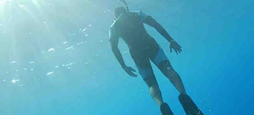 Is it easier to swim in a wet suit?